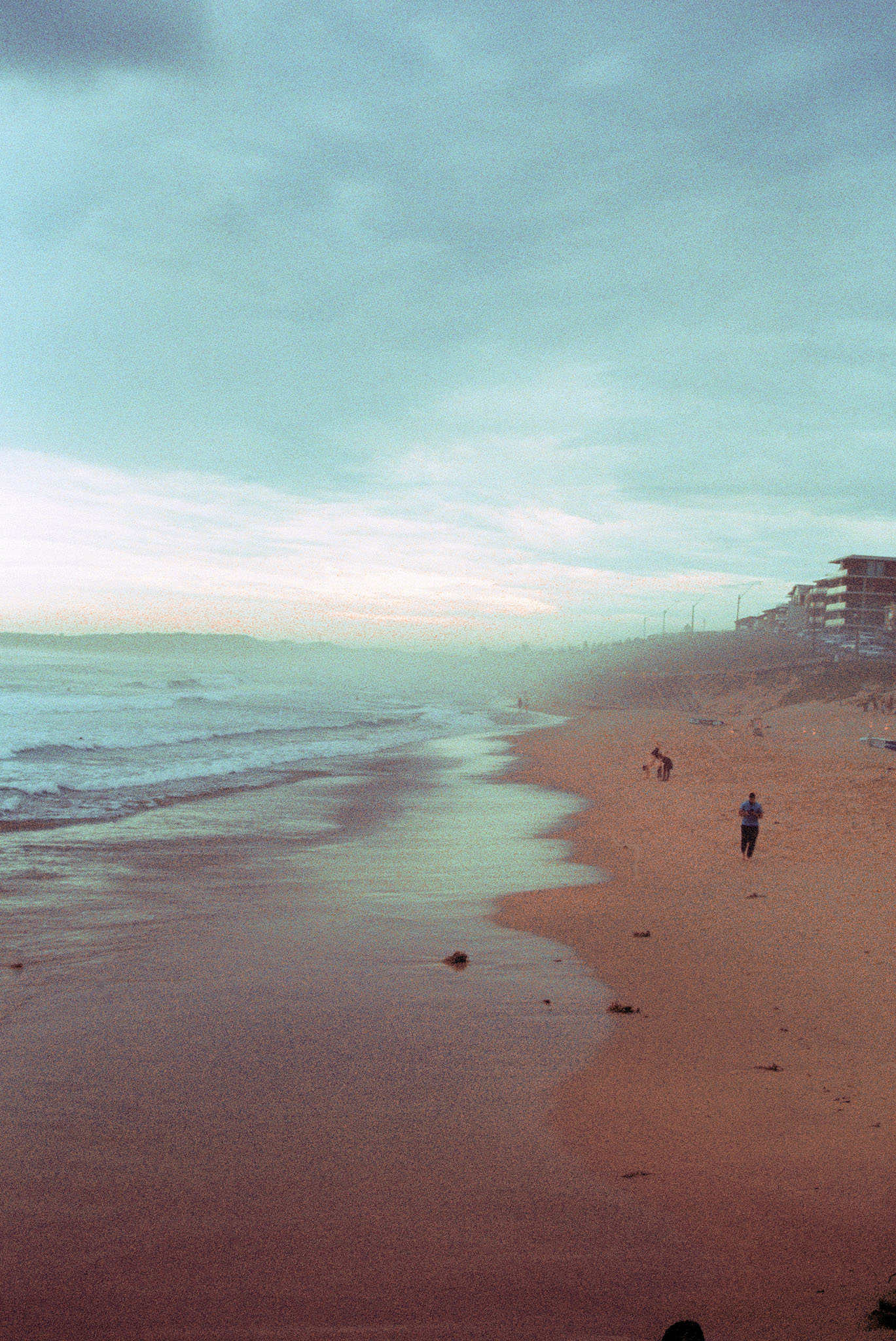 Figure suspended in tidal water at Cronulla — 35mm cross-processed Fuji Velvia 100